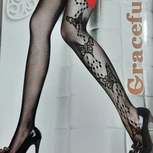 جوارب شلواری توری فانتزی زنانه مدل طرح‌دار مشکی (8 طرح) کد 8088